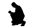 Kneeling Praying Man Silhouette
